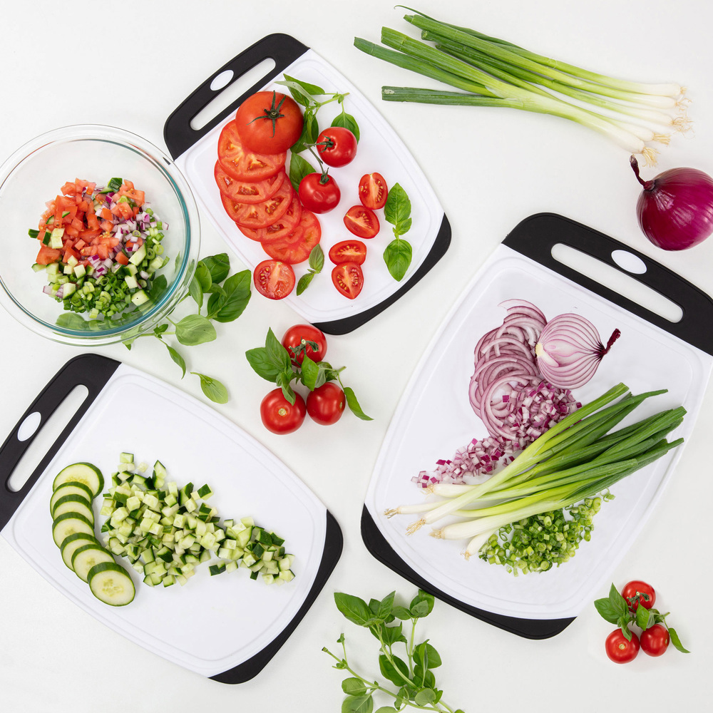 thumbnail video image 2 of GORILLA GRIP Oversized 100% BPA Free Reversible Kitchen Cutting Board Set of 3, Juice Grooves, Dishwasher Safe, Red Blue Green, 2 of 10