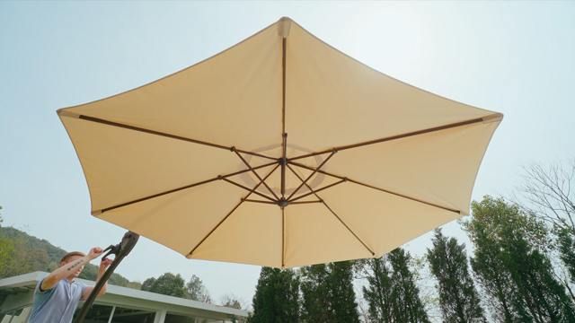thumbnail video image 2 of GRANDPATIO 11 ft Outdoor Patio Umbrella with Base, Curved Offset Cantilever Umbrella for Patio Pool Deck, Champagne, 2 of 9