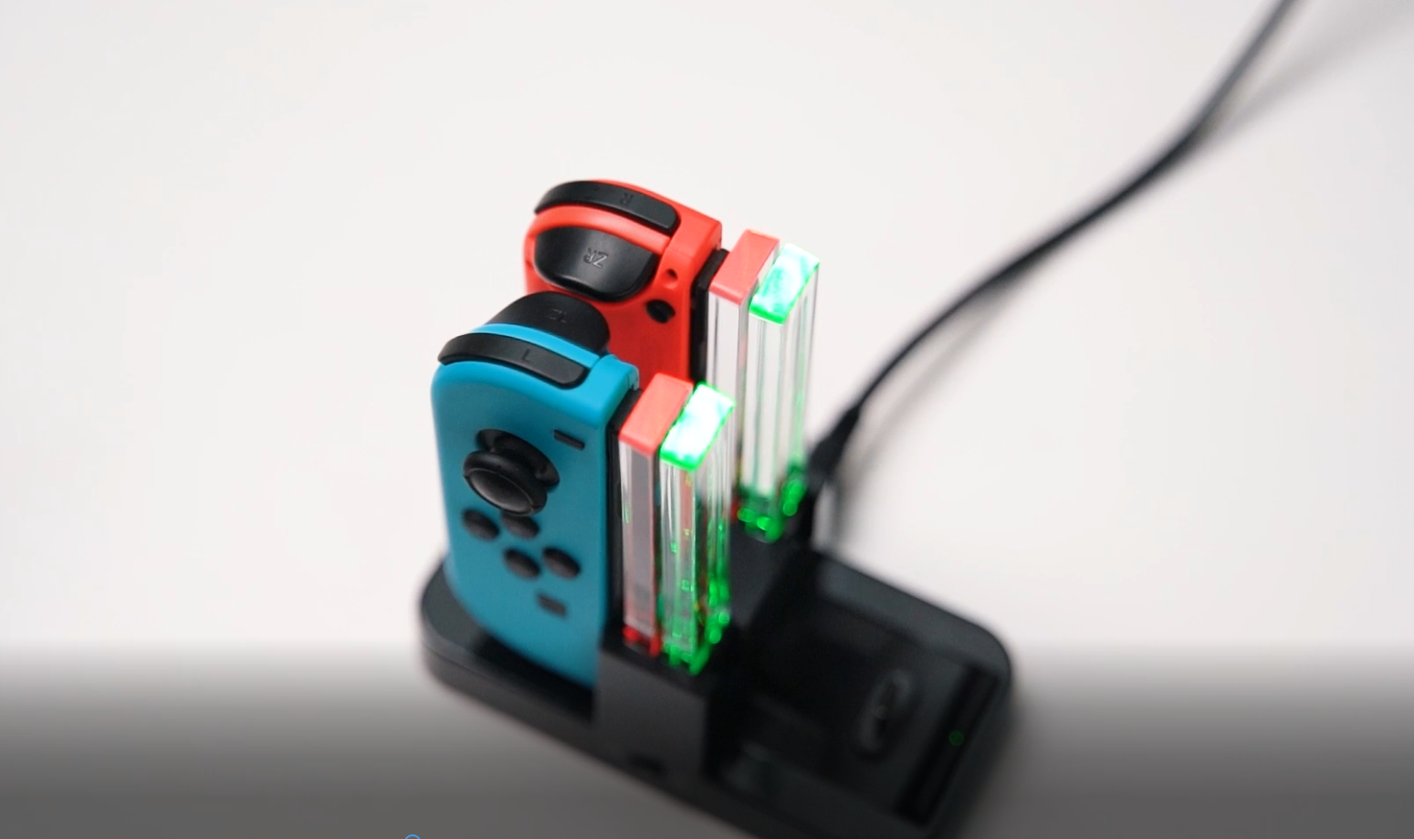 thumbnail video image 2 of TALK WORKS Nintendo Switch Joycon & Pro Controller Charger Station 4-Remote Charging Dock, LED, 2 of 7