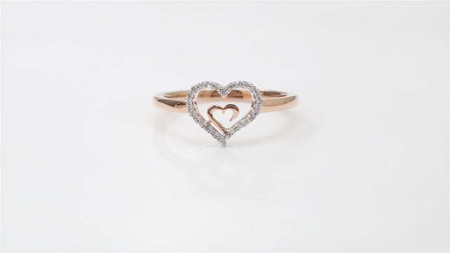 thumbnail video image 2 of 1/10Ct TDW Diamond 10k Rose Gold Heart in Heart Fashion Ring, 2 of 9