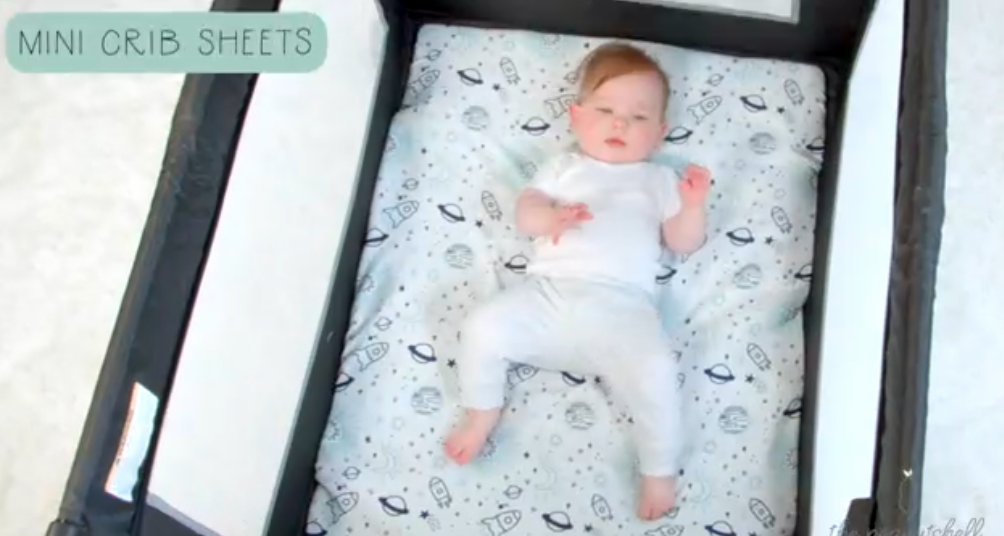 thumbnail video image 2 of The Peanutshell Pack n Play, Mini Crib, Portable Crib or Fitted Playard Sheets for Baby Girl, Pink Daisy, 3 Pack Set, 2 of 10